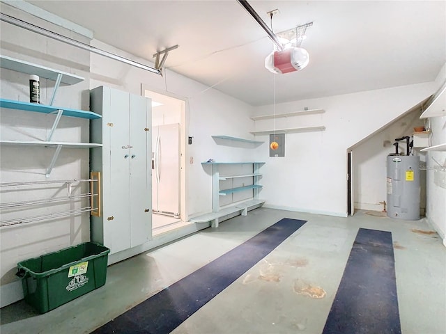 garage featuring electric panel, electric water heater, and a garage door opener