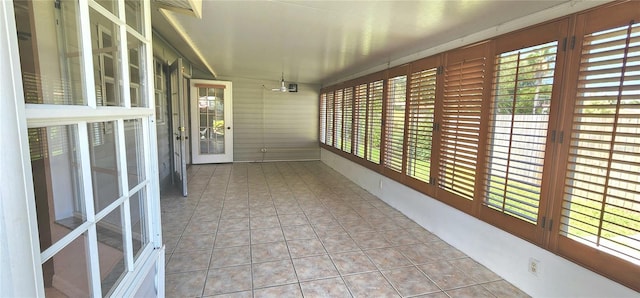 11722 Currie Ln Unit E1, Largo, FL 33774 - unfurnished sunroom featuring healthy amount of natural light