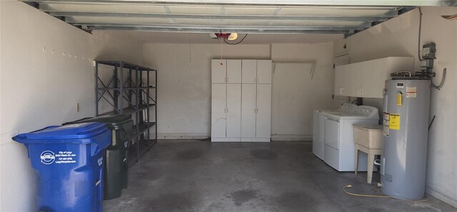 11722 Currie Ln Unit E1, Largo, FL 33774 - garage with washer and clothes dryer, electric water heater, and a garage door opener