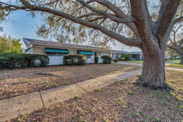 view of front of property with brick siding