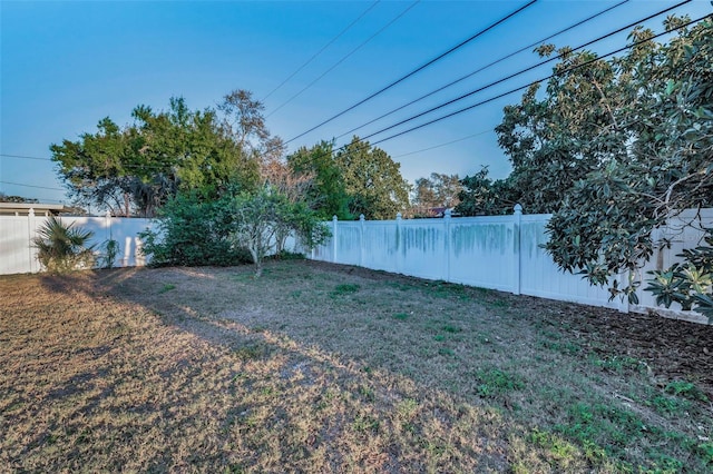 view of yard featuring a fenced backyard