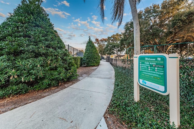 view of property's community with fence