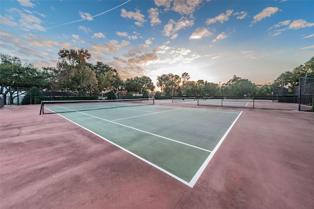 view of sport court with fence