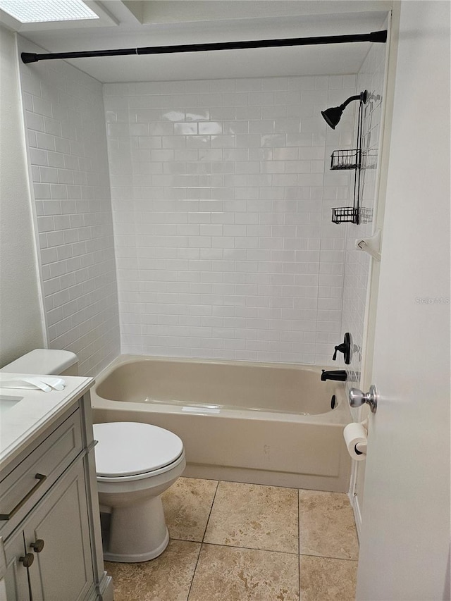 bathroom featuring tile patterned flooring, shower / bathing tub combination, vanity, and toilet