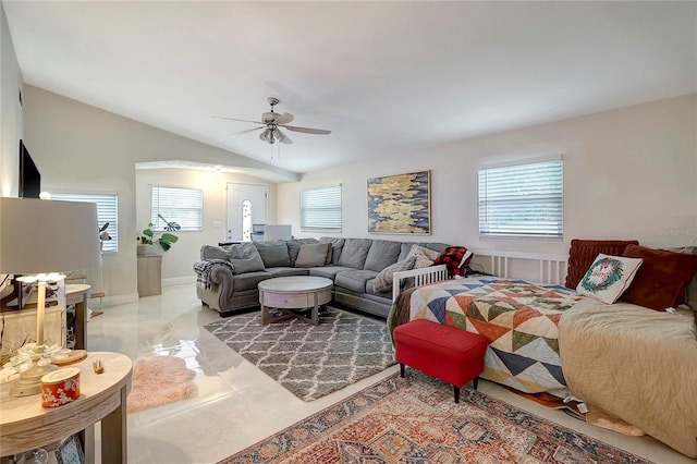 living area with lofted ceiling and ceiling fan