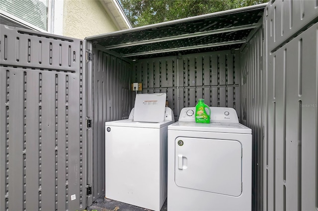 laundry area featuring laundry area and separate washer and dryer