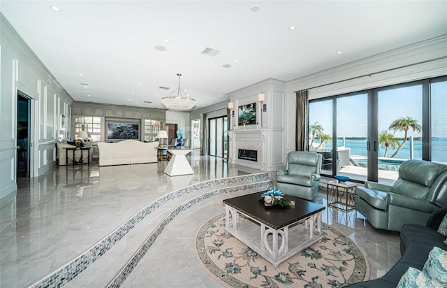 living area with a high end fireplace, marble finish floor, visible vents, and a decorative wall