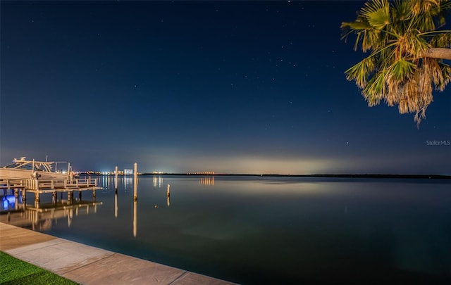 dock area featuring a water view