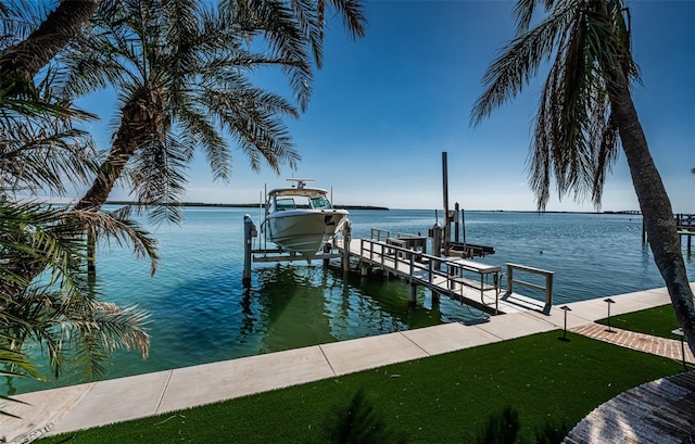 view of dock with a water view and boat lift