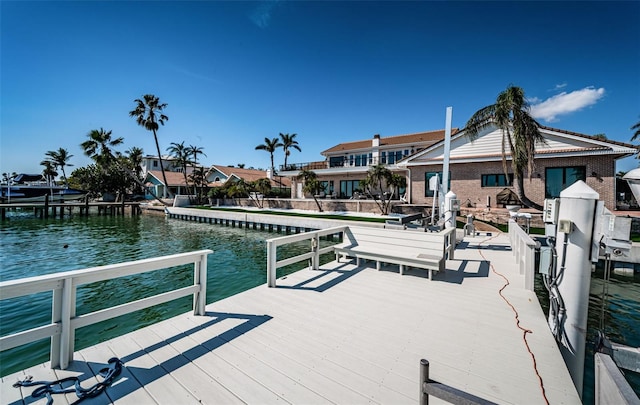 view of dock with a water view