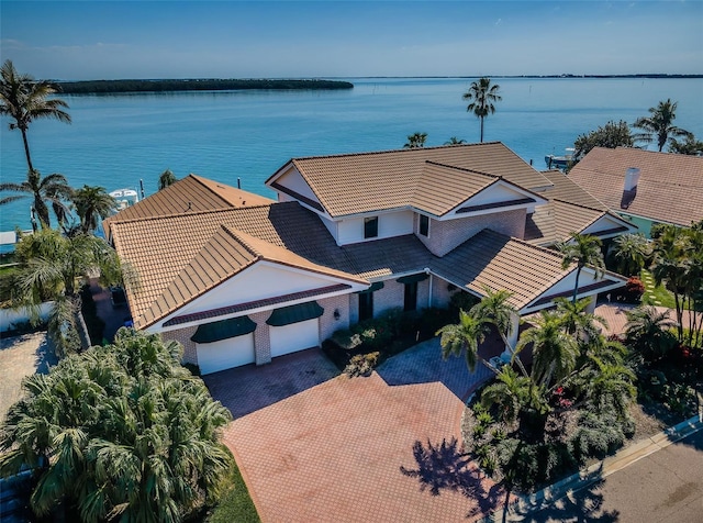 drone / aerial view with a water view