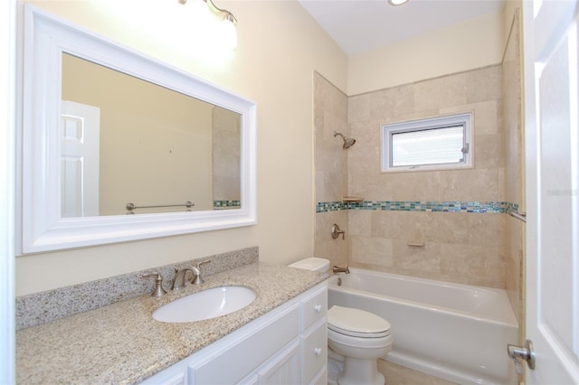 bathroom featuring shower / washtub combination, vanity, and toilet