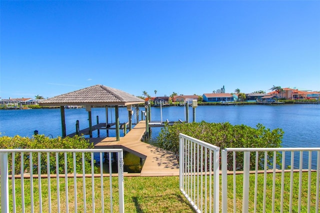 dock area featuring a water view and boat lift