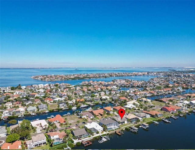 aerial view with a water view and a residential view