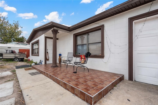 view of patio with a garage