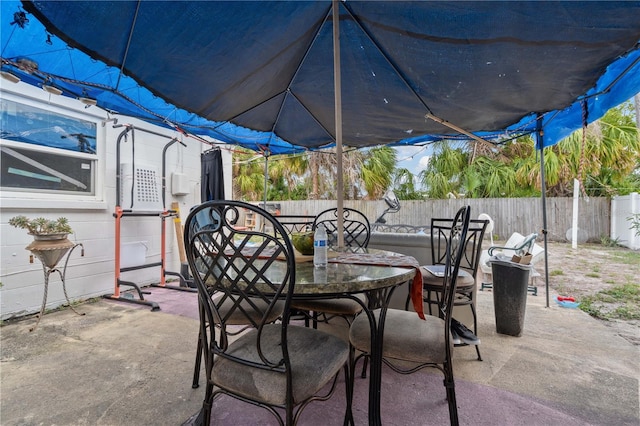 view of patio / terrace with outdoor dining area and a fenced backyard