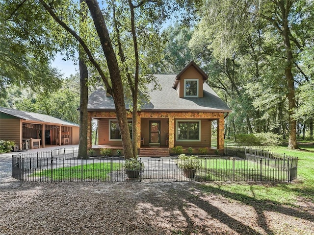 4845 SW 78th Ave, Bushnell, FL 33513 - view of front of home featuring a fenced front yard, a gate, a shingled roof, and a porch