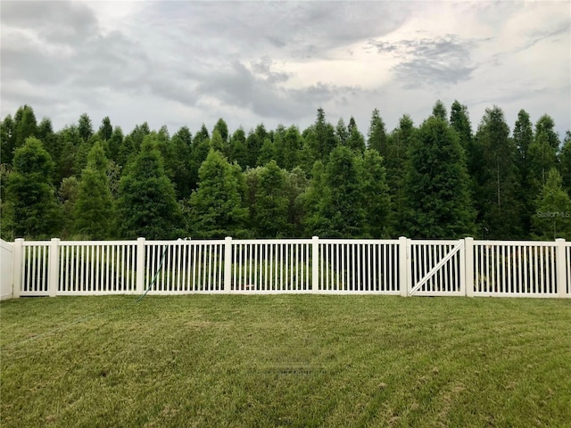 view of yard with fence