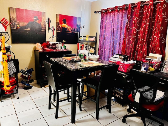 view of tiled dining space