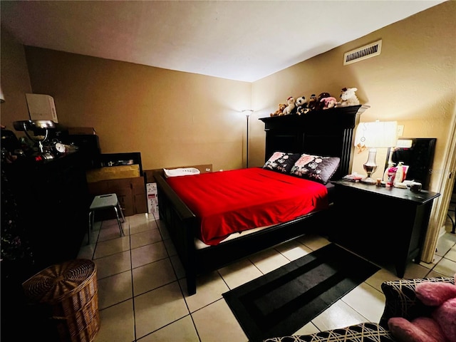 tiled bedroom featuring visible vents