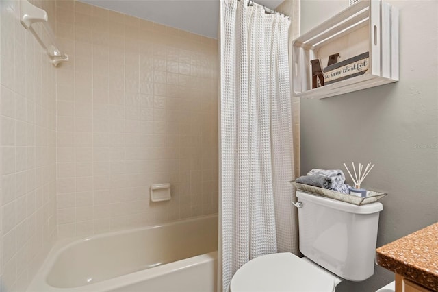 full bathroom with shower / bath combo with shower curtain and toilet