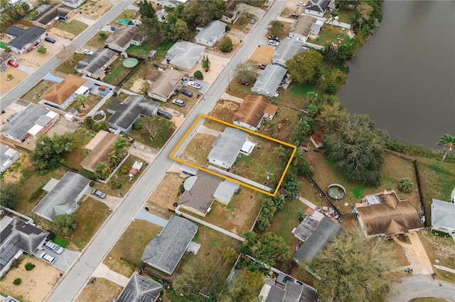 birds eye view of property with a residential view