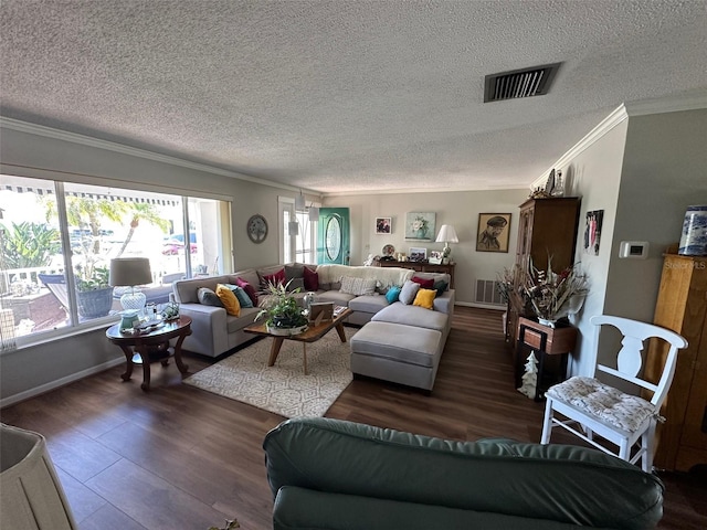 living area featuring ornamental molding, wood finished floors, and visible vents