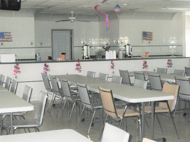 dining space with a ceiling fan