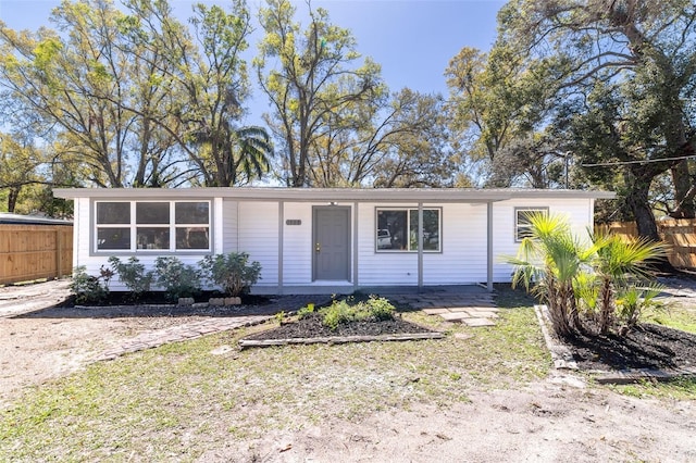 view of front of home with fence