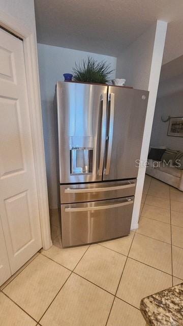 3805 Gulf Blvd Unit 404, St Pete Beach, FL 33706 - kitchen view of stainless steel refrigerator with ice dispenser