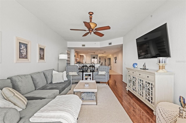 3805 Gulf Blvd Unit 404, St Pete Beach, FL 33706 - carpeted living room featuring a ceiling fan