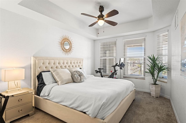 3805 Gulf Blvd Unit 404, St Pete Beach, FL 33706 - bedroom with a raised ceiling, light carpet, and ceiling fan