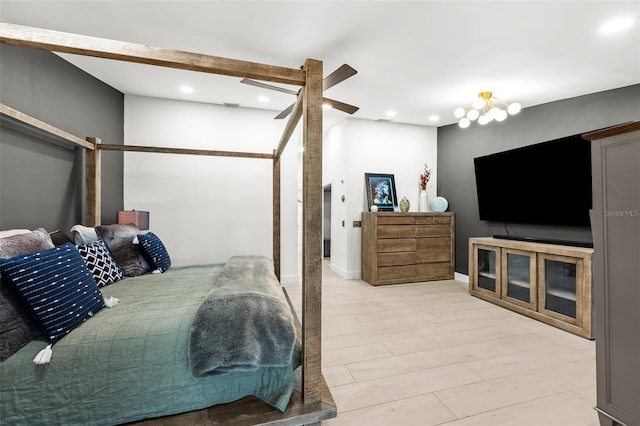 bedroom featuring baseboards, light wood-style flooring, and recessed lighting