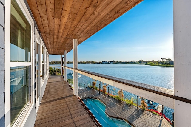 balcony featuring a water view