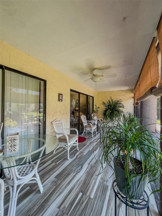 wooden terrace with ceiling fan