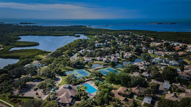 birds eye view of property with a residential view and a water view