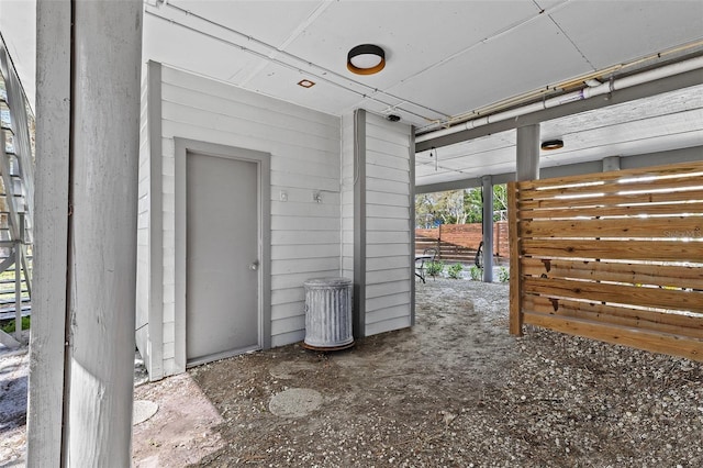 interior space featuring wooden walls