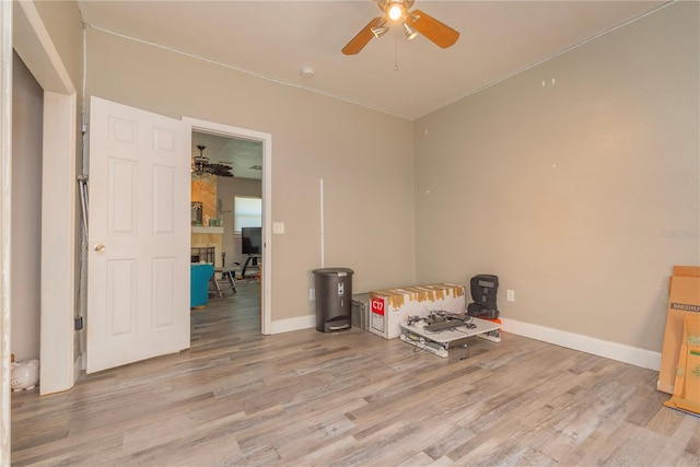 313 Jefferson Ave S, Oldsmar, FL 34677 - miscellaneous room with baseboards, light wood-type flooring, and a ceiling fan