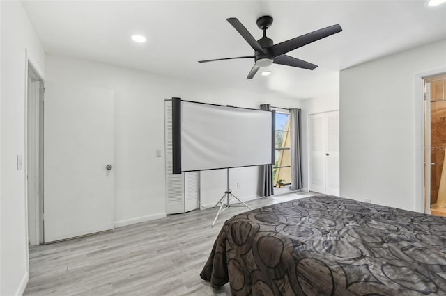 bedroom featuring baseboards, ceiling fan, wood finished floors, and recessed lighting