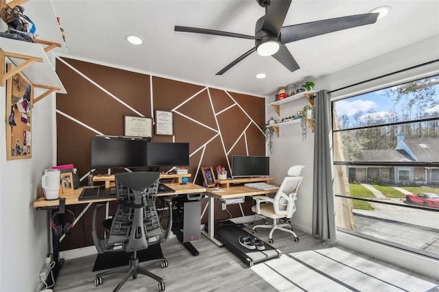 home office with wood finished floors, a ceiling fan, and recessed lighting