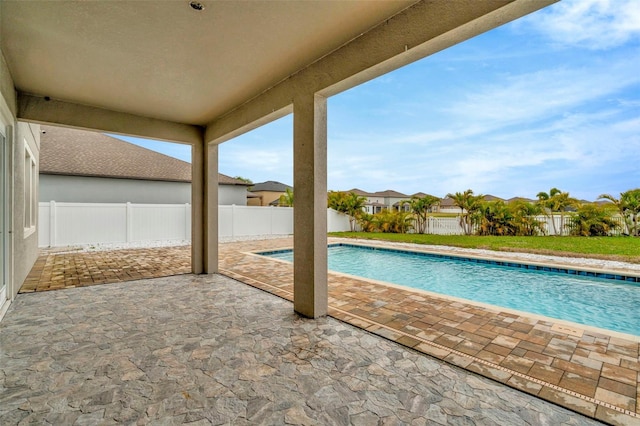 view of pool with a fenced backyard, a fenced in pool, and a patio