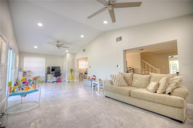 living room featuring recessed lighting, visible vents, stairway, ceiling fan, and high vaulted ceiling