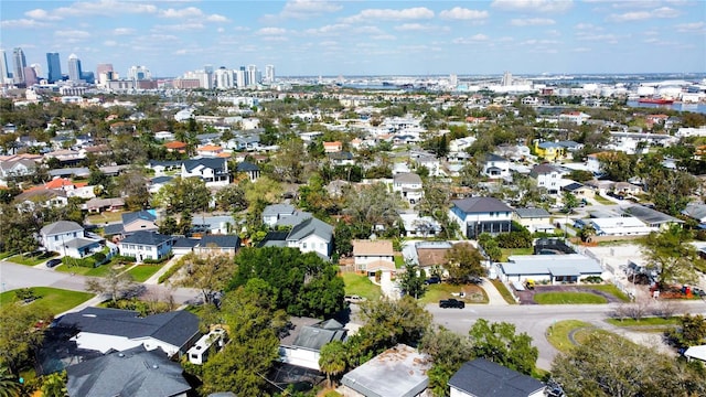 birds eye view of property with a view of city