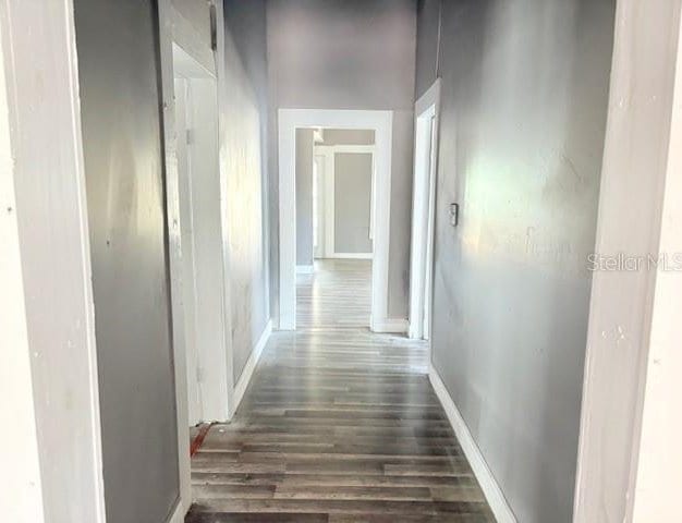 2410 Harper St, Tampa, FL 33605 - corridor featuring baseboards and wood finished floors