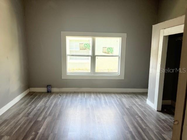 2410 Harper St, Tampa, FL 33605 - unfurnished room featuring baseboards and wood finished floors