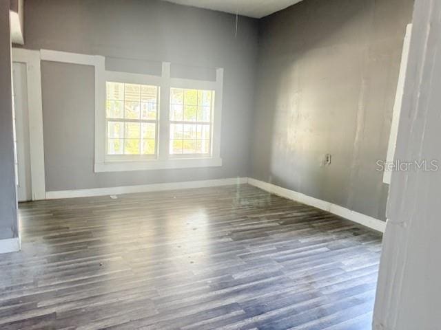 2410 Harper St, Tampa, FL 33605 - spare room with baseboards and wood finished floors