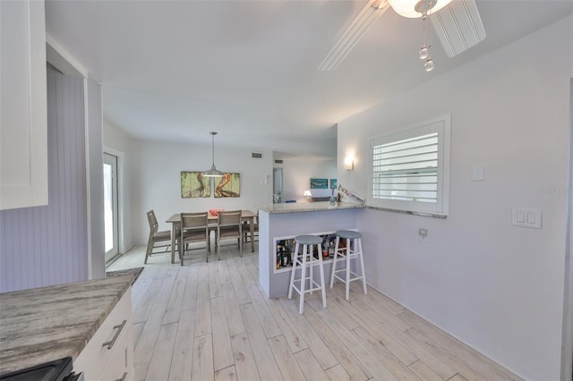 dining room featuring light wood-type flooring