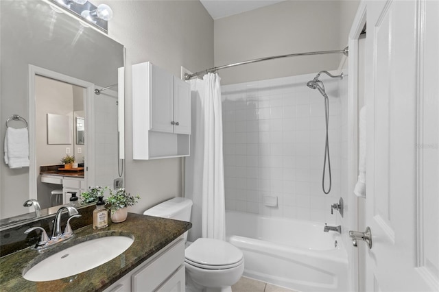 bathroom featuring tile patterned floors, vanity, toilet, and shower / tub combo