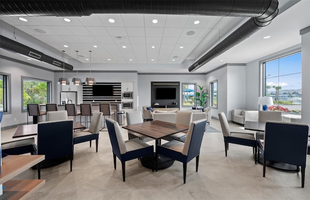 dining space featuring baseboards, visible vents, and recessed lighting