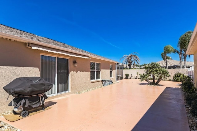 view of patio featuring a fenced backyard and grilling area